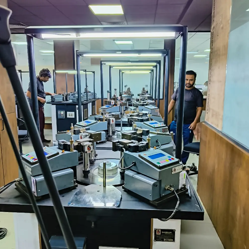 Workers assembling machinery at Shubham Technology